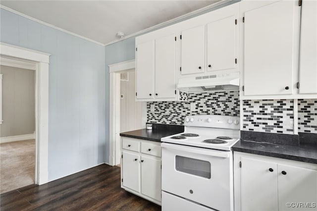 kitchen featuring dark countertops, under cabinet range hood, white electric range oven, and crown molding