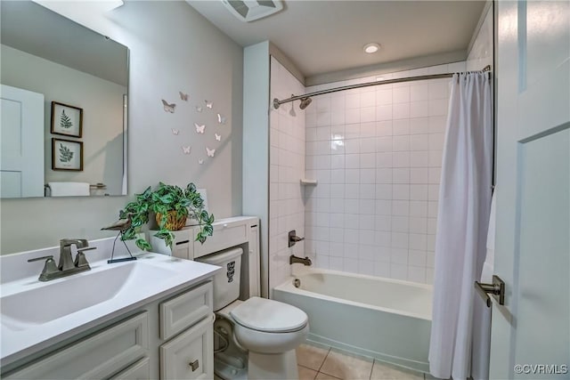 full bath with visible vents, toilet, tile patterned flooring, shower / bath combination with curtain, and vanity