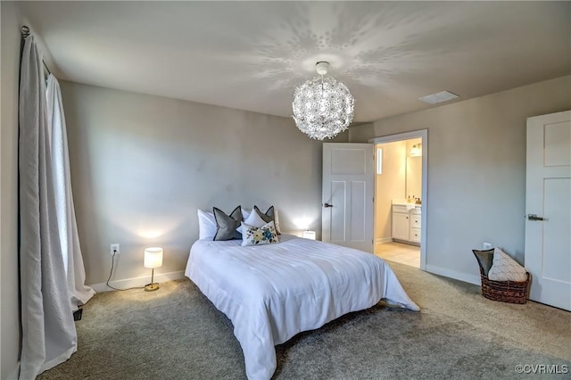 bedroom with light carpet, baseboards, visible vents, connected bathroom, and a chandelier