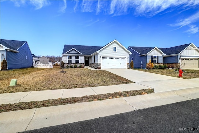 view of front of home featuring a garage, stone siding, fence, and concrete driveway