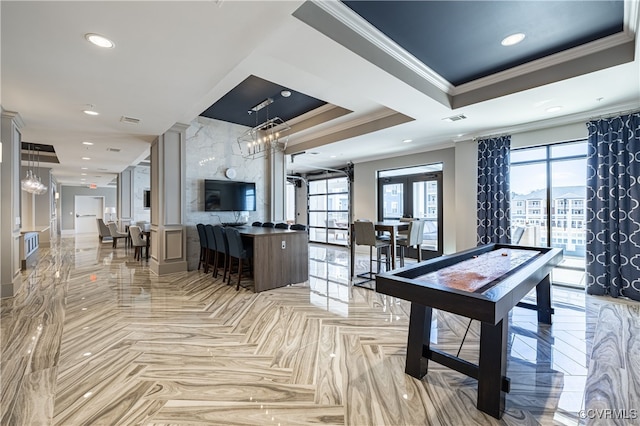 recreation room with recessed lighting, visible vents, a raised ceiling, and crown molding