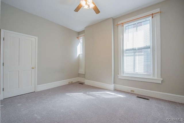 1005 W Franklin St Unit U2, Richmond, VA 23220 - carpeted spare room with plenty of natural light, baseboards, ceiling fan, and visible vents