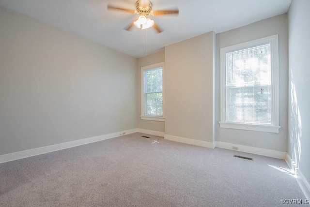 1005 W Franklin St Unit U2, Richmond, VA 23220 - unfurnished room featuring baseboards, visible vents, a ceiling fan, and light carpet