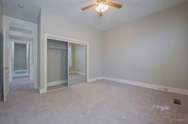 1005 W Franklin St Unit U2, Richmond, VA 23220 - unfurnished bedroom with a closet, visible vents, carpet, baseboards, and ceiling fan