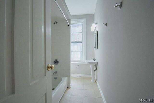 1005 W Franklin St Unit U2, Richmond, VA 23220 - full bathroom with baseboards, shower / tub combination, tile patterned flooring, and a sink