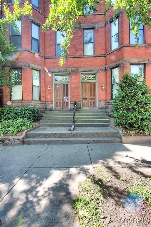 1005 W Franklin St Unit U2, Richmond, VA 23220 - doorway to property with brick siding