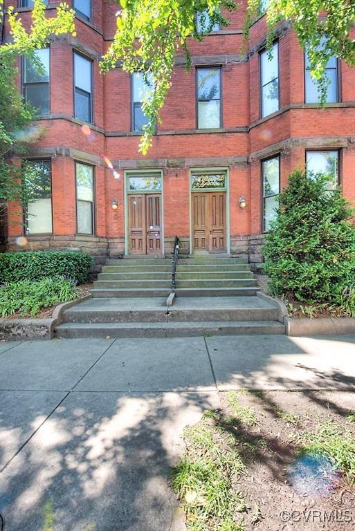 1005 W Franklin St Unit U2, Richmond, VA 23220 - view of exterior entry with brick siding