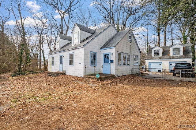 view of side of property featuring fence