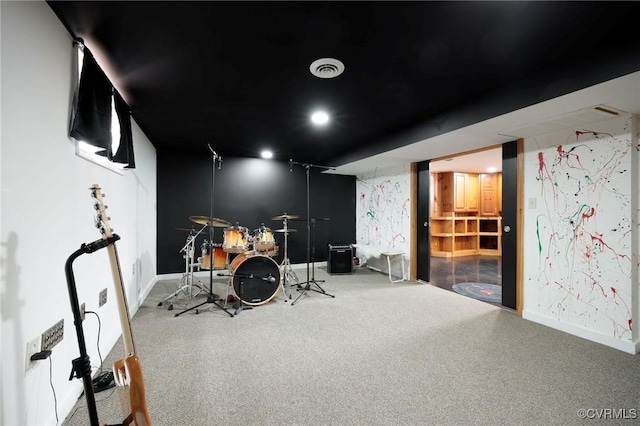 interior space featuring visible vents, baseboards, and carpet floors