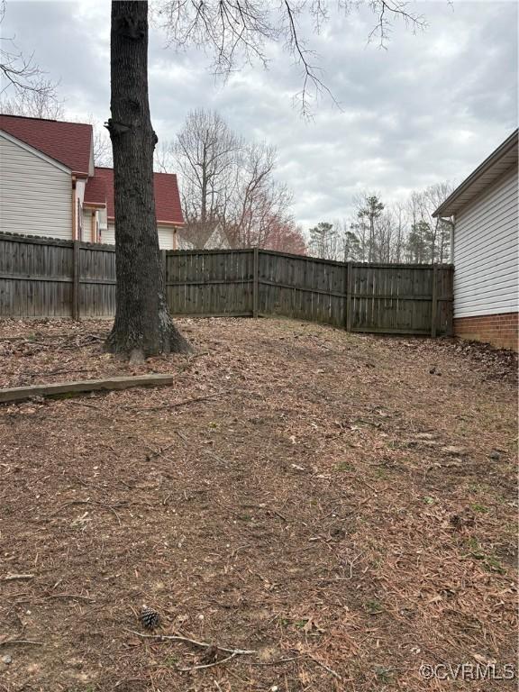 view of yard featuring fence