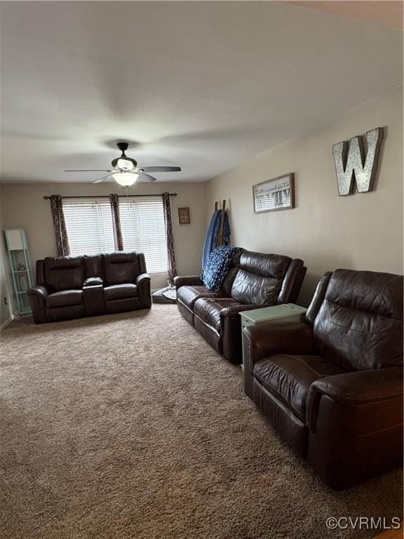 living room with carpet and ceiling fan