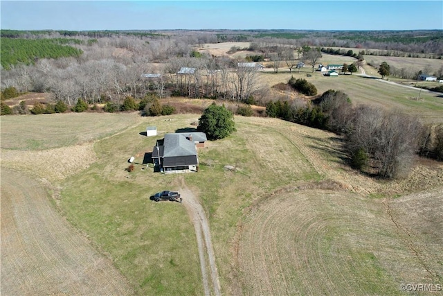 birds eye view of property with a rural view