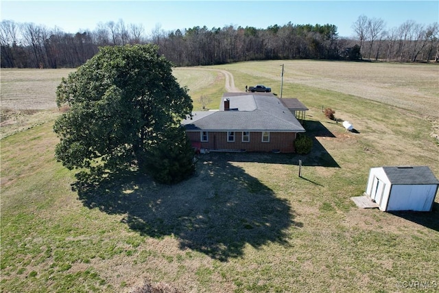 aerial view with a forest view and a rural view