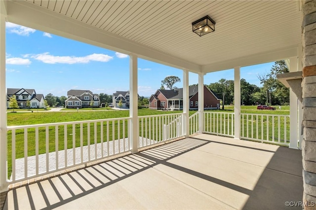 view of patio with a porch and a residential view