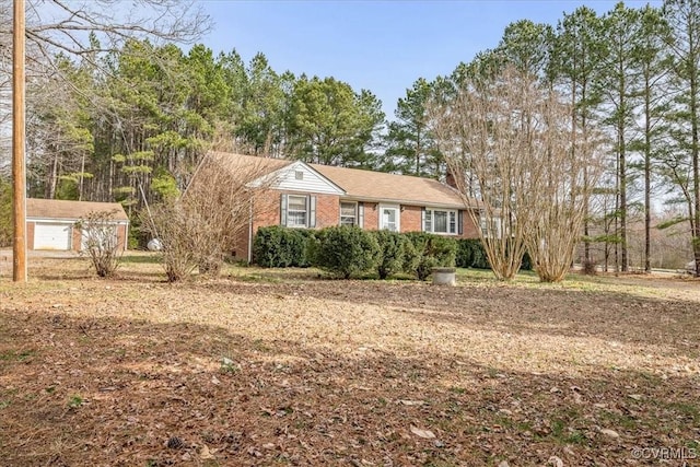 view of front of home featuring brick siding