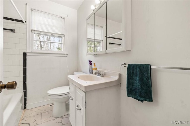 full bathroom with marble finish floor, toilet, vanity, and shower / bathing tub combination