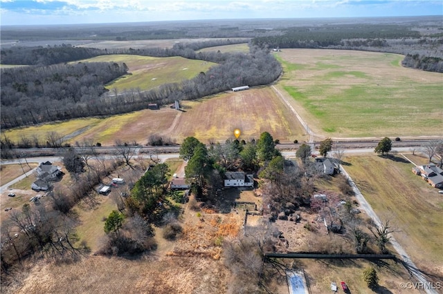 birds eye view of property featuring a rural view