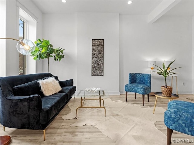 sitting room with recessed lighting, baseboards, and wood finished floors