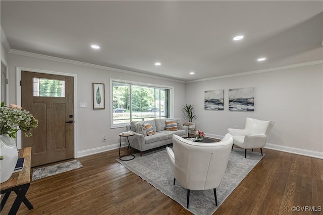 living area with dark wood finished floors, recessed lighting, baseboards, and ornamental molding