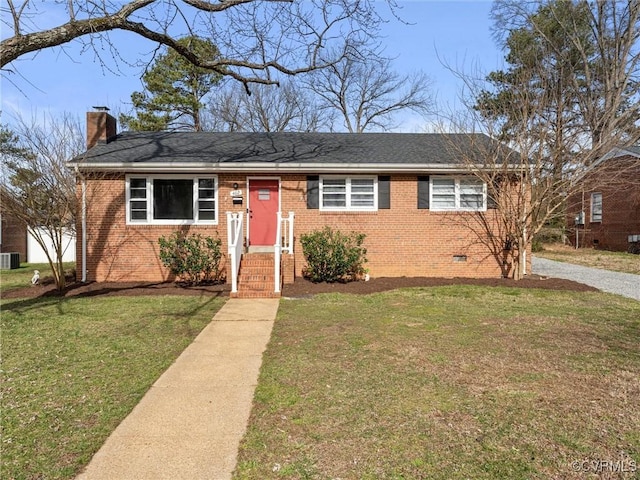 view of front facade with crawl space, a chimney, a front lawn, and brick siding