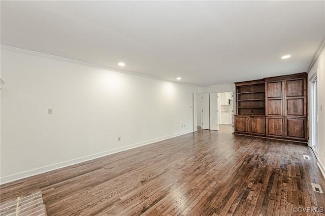 unfurnished living room with recessed lighting, baseboards, dark wood-type flooring, and ornamental molding