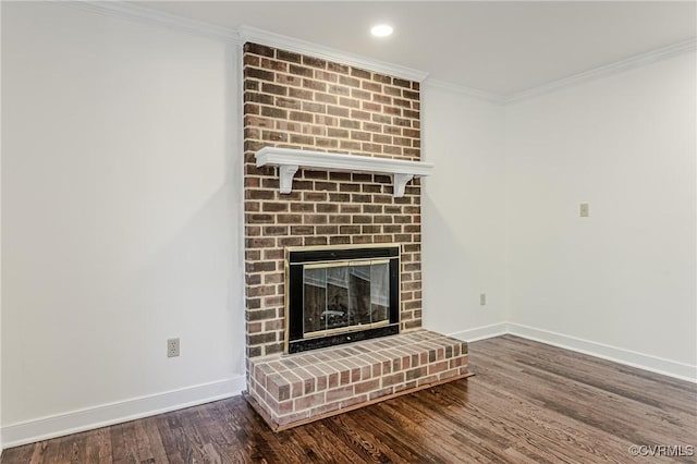 unfurnished living room with wood finished floors, baseboards, a fireplace, recessed lighting, and ornamental molding