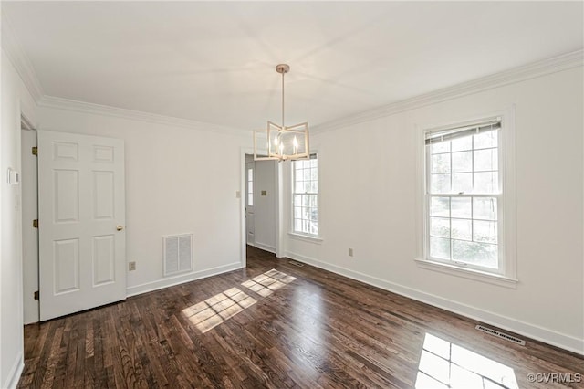 unfurnished room with visible vents, a healthy amount of sunlight, and dark wood-style flooring