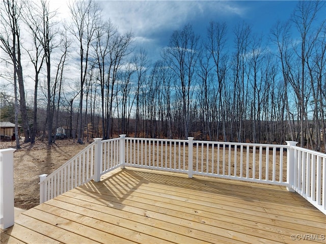 wooden terrace with a forest view