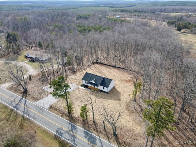 aerial view featuring a view of trees