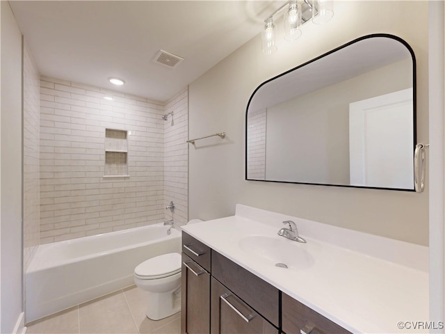 full bathroom featuring vanity, visible vents, tile patterned flooring, shower / washtub combination, and toilet