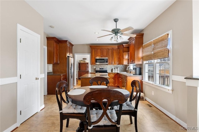 dining area with recessed lighting, visible vents, baseboards, and ceiling fan