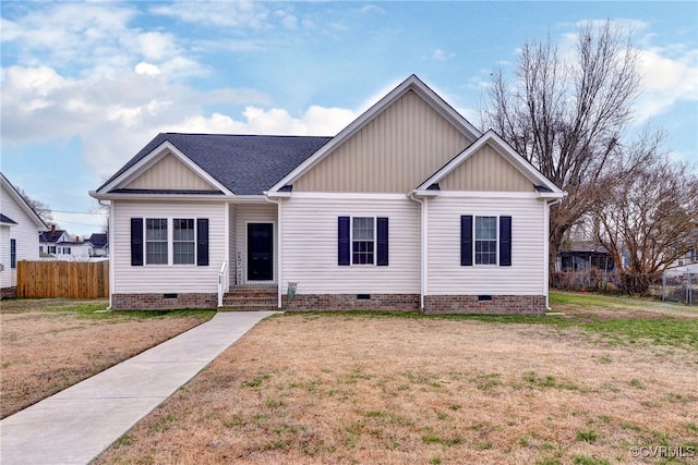 view of front of home featuring crawl space, a front yard, and fence