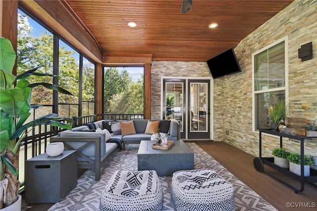 sunroom featuring wooden ceiling