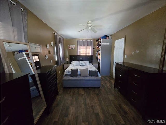 bedroom featuring dark wood-type flooring and ceiling fan