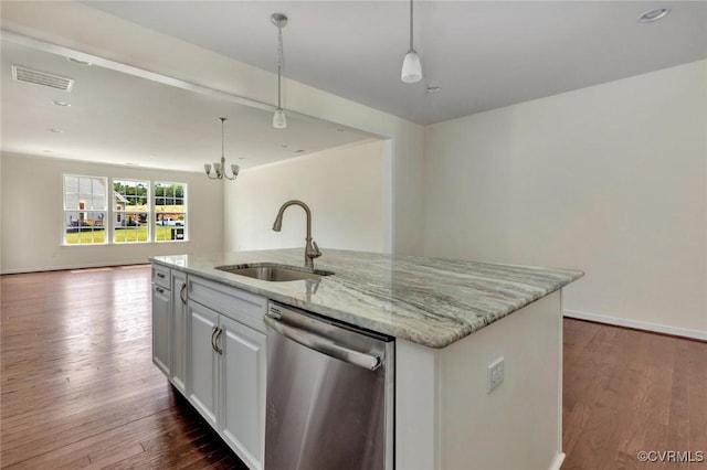 kitchen with visible vents, dark wood finished floors, open floor plan, stainless steel dishwasher, and a sink