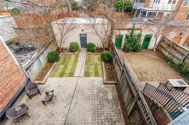 exterior space with a fenced backyard