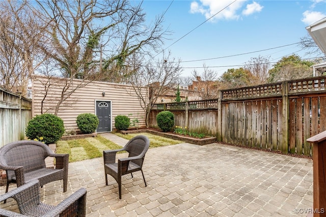 view of patio with a fenced backyard