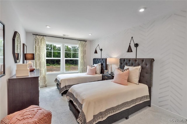 carpeted bedroom featuring recessed lighting, visible vents, and baseboards