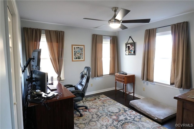 office with a ceiling fan, baseboards, and a wealth of natural light