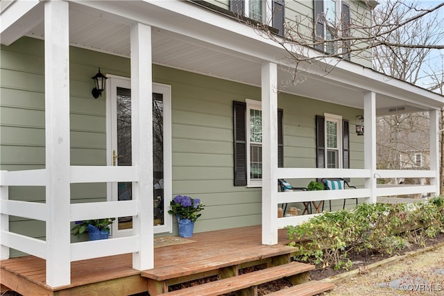 entrance to property with covered porch