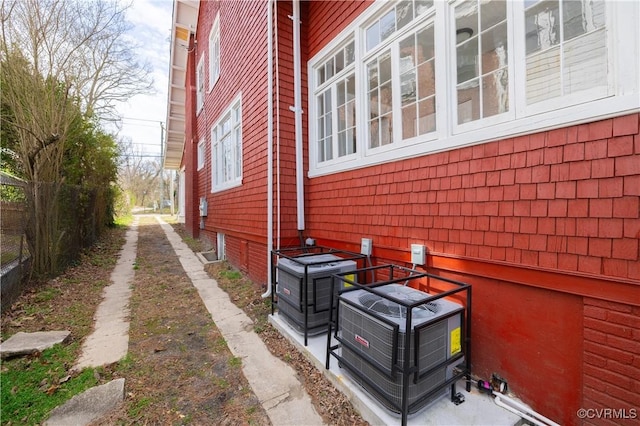 view of home's exterior featuring central AC