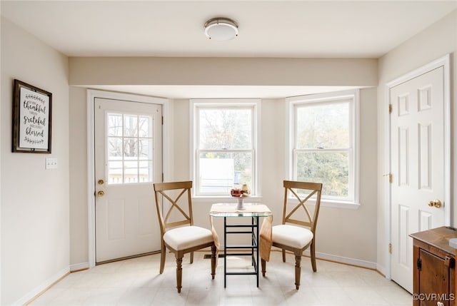 dining space with baseboards