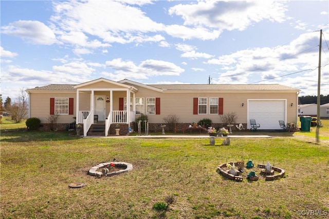 view of front facade featuring crawl space, covered porch, an attached garage, and a front lawn