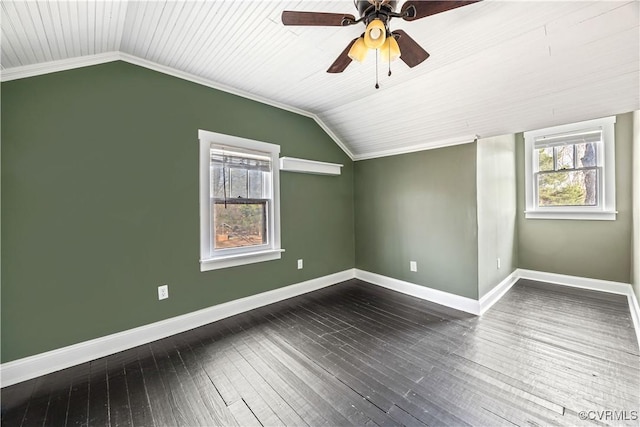 bonus room featuring baseboards, lofted ceiling, a ceiling fan, and dark wood-style flooring