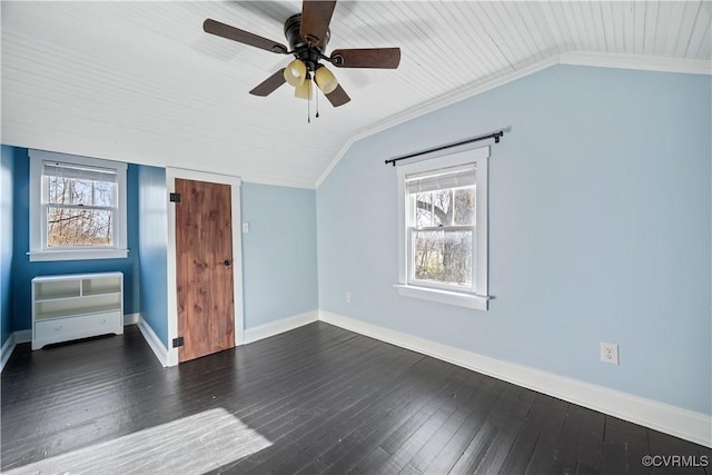 bonus room featuring dark wood finished floors, wooden ceiling, baseboards, ceiling fan, and vaulted ceiling