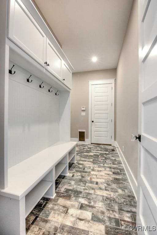 mudroom featuring baseboards