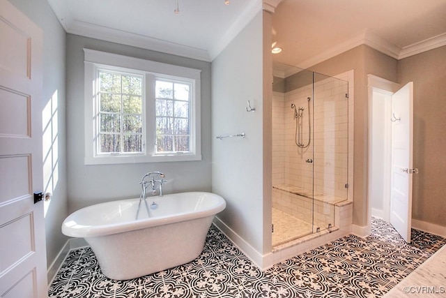 bathroom featuring tile patterned flooring, a stall shower, and ornamental molding