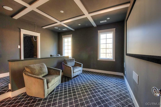 sitting room with visible vents, beamed ceiling, coffered ceiling, and baseboards