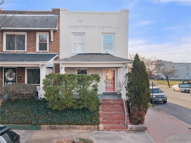 multi unit property featuring brick siding