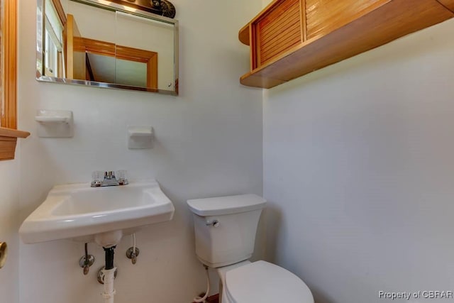 bathroom featuring toilet